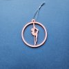 Pink Glow in the Dark Pole Dance Ornament (Pose B) on a blue background. Poledance Xmas Gift Idea